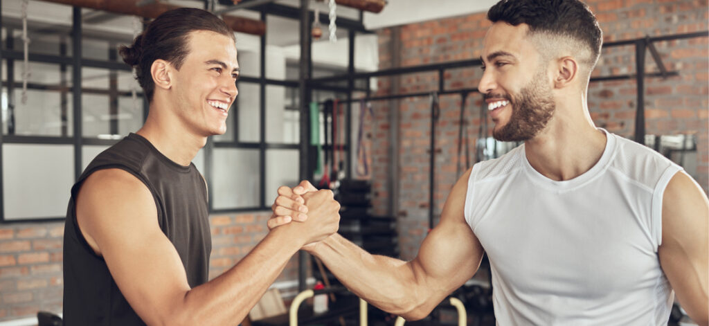 Image of personal trainer after a fitness coaching session thanking his client, improving client loyalty and client retention