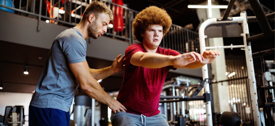 Image of Personal Trainer helping Gen Z Clients