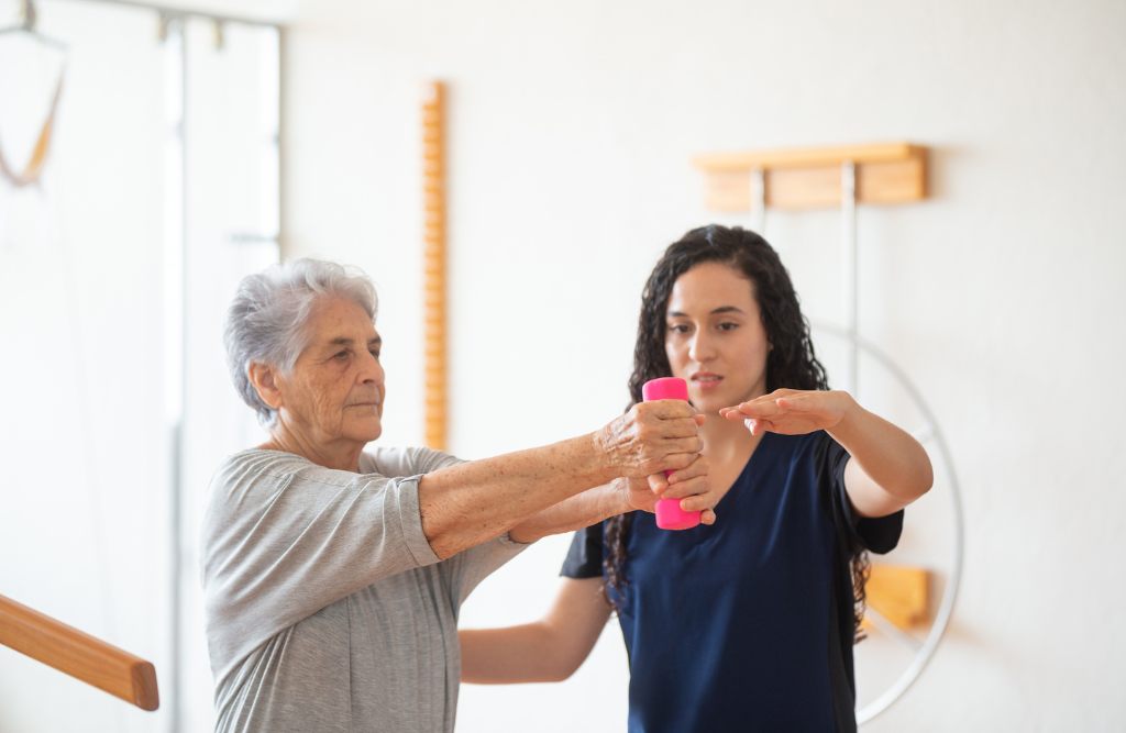 Occupational therapist working with elderly client